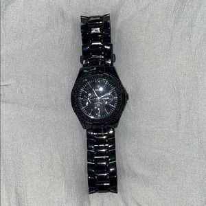 Women’s black guess watch